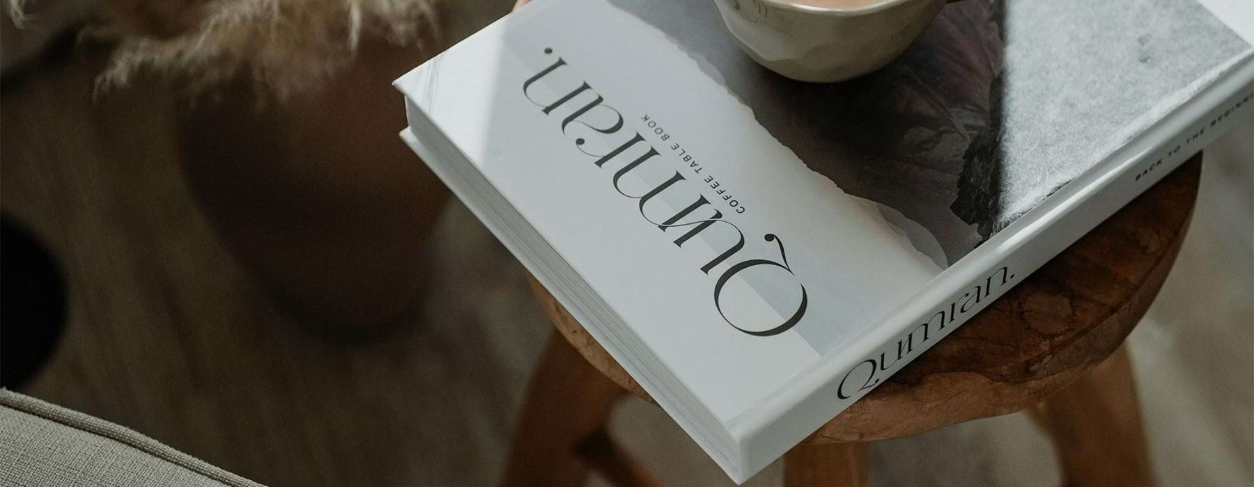 a cup of coffee on a book